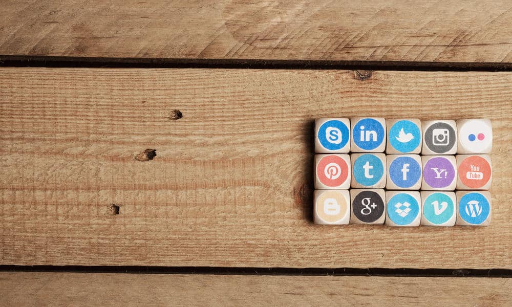 Wooden blocks with social media symbols